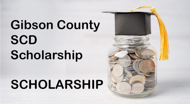 Graduation gap hat on coins money in jar for education fund; stu