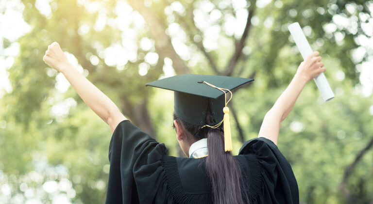 successful graduating student with nature background